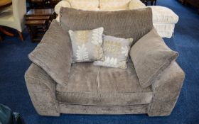 Large Plush Armchair Oversized armchair with multi tonal scatter cushions, upholstered in slate grey