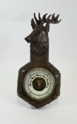 Small Carved Barometer surmounted with a head of a reindeer.