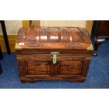 Carved Wood Chest Ornamental dark wood chest in Anglo Indian style.