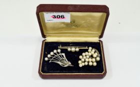 Three Silver And Pearl Set Brooches Two by Mikimoto with stamp and hallmark to bar,