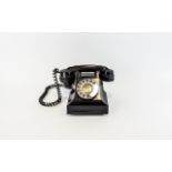 A TYPE 328F BLACK BAKELITE TELEPHONE, impressed mark 164 - 50. Wired for modern use.