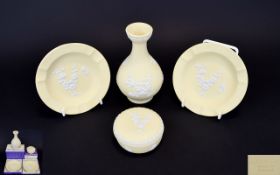Small Collection Of Wedgwood Jasperware Four items in total in primrose yellow with white Japonica