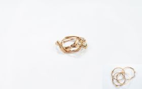 9ct Gold Interlocking Rings ( 4 ) Not Marked but Tests Gold. 3.6 grams.