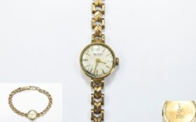 Waltham Ladies Mechanical 9ct Gold Wrist Watch with Integral 9ct Gold Bracelet.