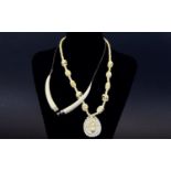 Antique Ivory Necklaces ( 2 ) In Total. 1/ Ivory Beaded Necklace with Carved Pendant Drop Showing