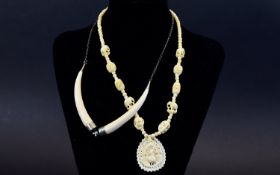 Antique Ivory Necklaces ( 2 ) In Total. 1/ Ivory Beaded Necklace with Carved Pendant Drop Showing