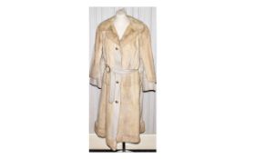 Vintage Lambs Leather And Mink Coat Long line ladies 1960's coat in cream leather with blonde mink