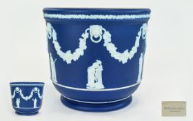 Wedgwood Jasperware Jardiniere Of cylindrical form, blue ground with raised,