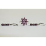 Rhodolite Garnet Cluster Ring and Drop Earrings, the ring comprising nine oval cut,