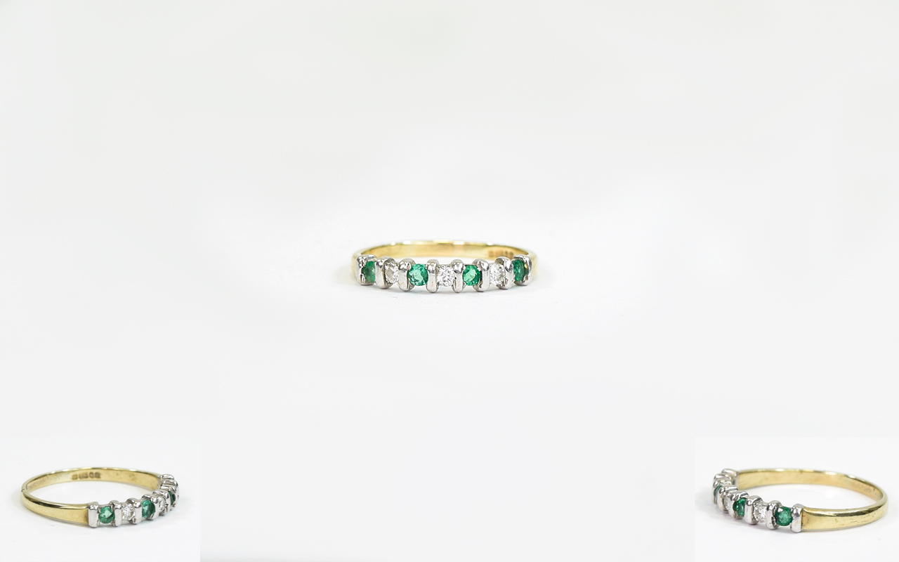 9ct Yellow Gold Set Seven Stone Emerald and Diamond Dress Ring. Fully Hallmarked. As New Condition.