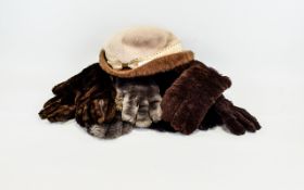 Leather and Fur Winter Gloves Four pairs in total to include plush grey fur and brown leather,