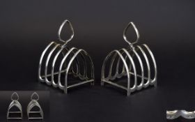 George V Pair of Silver Arched Shaped 4 Tier Toast Racks with a Hallmark for Birmingham 1930,