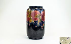 W. Moorcroft Signed Large Vase ' Pomegranate ' Design on Blue Ground. c.1920.