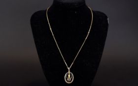 Antique 9ct Gold Pendant and Chain. The Pendant Set with Tear Drop Shaped Amethyst and Pearl.