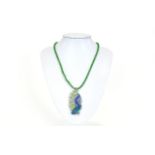 Green and Blue Crystal Exotic Fish Pendant Necklace on green mesh caged crystal