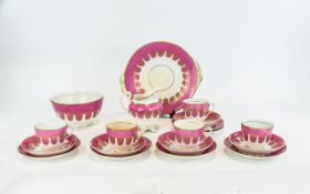 Part Teaset, pink and gold decoration. C