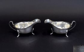 Elizabeth II Pair of Silver Gravy Boats, Shaped Borders, Splayed Feet.