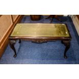 Coffee Table Dark wood with carved legs and apron,