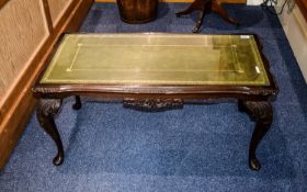 Coffee Table Dark wood with carved legs and apron,