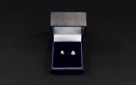 9ct Yellow Gold Set Pair of Diamond Stud Earrings. The Diamonds of Good Colour and Clarity.