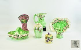 A Collection Of Maling Lustreware In Embossed Blossom Bough Green Pattern.