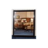 Large Bevelled Glass Mirror Early 20th century mirror in ebonised wood frame of plain form.