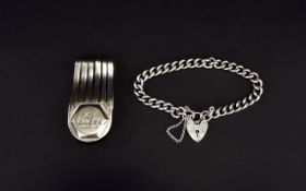 Gucci Silver Money Clip. Marked 925 + A Silver Curb Bracelet with Heart Shaped Silver Padlock.