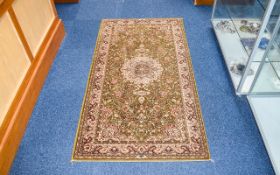 Pure Wool Kohinoor Rug, made in Belgium. Floral decoration in antique green colour.