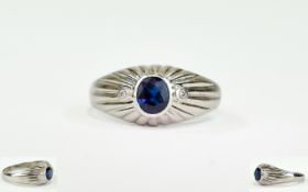 14ct White Gold Set Single Stone Sapphire and Diamond Ring.