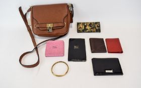 Faux Leather Cross Body Bag And Five Assorted Wallets.