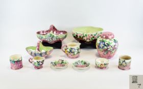 A Large Collection Of Maling Lustreware In Embossed Blossom Bough Design.