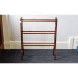 Vintage Clothes Horse Turned wood three bar clothes drier with aged patina.
