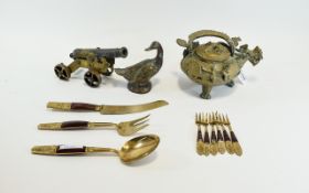 Small Collection of Metalware including flatware, canon, bird figure and dragon lidded pot.