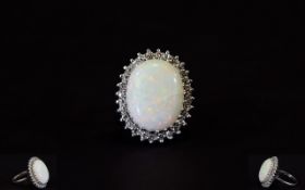 18ct White Gold Set Opal and Diamond Cluster Ring.