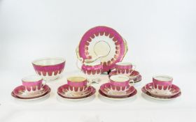 Part Teaset, pink and gold decoration.