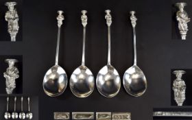 18th Century Matched Set of Four Silver Spoons with Later Attached Figural Finials.
