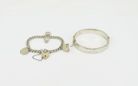 Silver Charm Bracelet Together With A Hinged Bangle