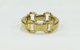 Michael Kors Bracelet Chunky gold tone bracelet in link and loop horsebit design.