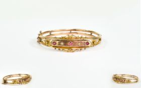 Edwardian Ornate and Attractive 9ct Gold Hinged Bangle Set with Rubies and Diamonds and Safety