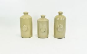 A Collection of Stoneware Hot Water Bottles from the 1940's (see photos. 10.75 inches high and 9.