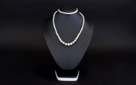 Antique Pearl Necklace Graduated sized pearls in short necklace with stone set clasp