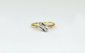 18ct Gold and Platinum Set 3 Stone Diamond Ring. Diamond Shoulder. Marked 18ct and Platinum.