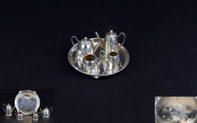 A Miniature Silver 5 Piece Tea and Coffee Set.