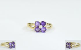 9ct Gold Amethyst And Diamond Ring Flower head setting with central diamond chip and amethyst