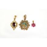 Three 9ct Gold Pendants, Set With Garnet, Turquoise And Ruby Coloured Stones.