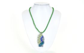 Green and Blue Crystal Exotic Fish Pendant Necklace on green mesh caged crystal