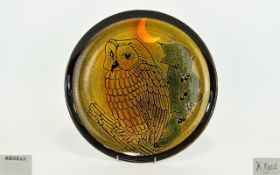 A Poole Aegean Owl Charger A large earthenware charger with handpainted owl design set against a