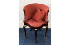 Antique Bedroom Chair Bucket shaped chair fashioned in dark wood with upholstered curved back and