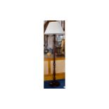 Mahogany Standard Lamp with cream shade. Height 70 inches.