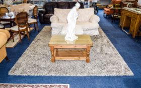 Room Size Beige Coloured Shaggy Pile Rug. 240 by 340cm. Made in Belgium.